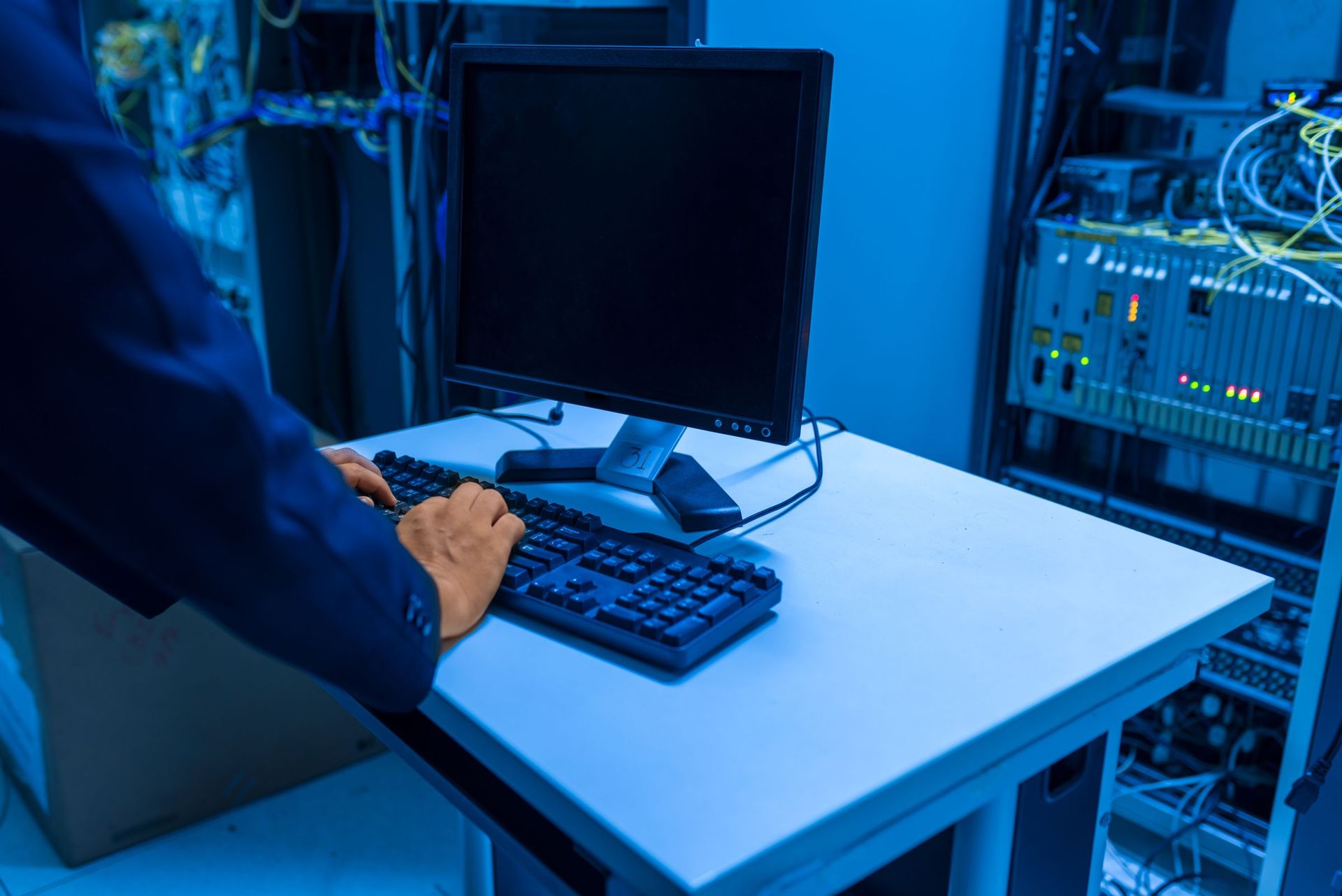 An engineer working on network and server infrastructure